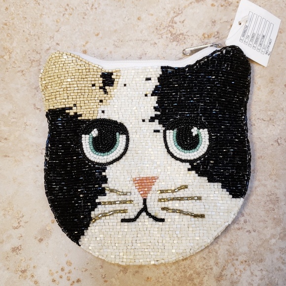 Urban Outfitters Handbags - Urban Outfitters beaded cat pouch NEW